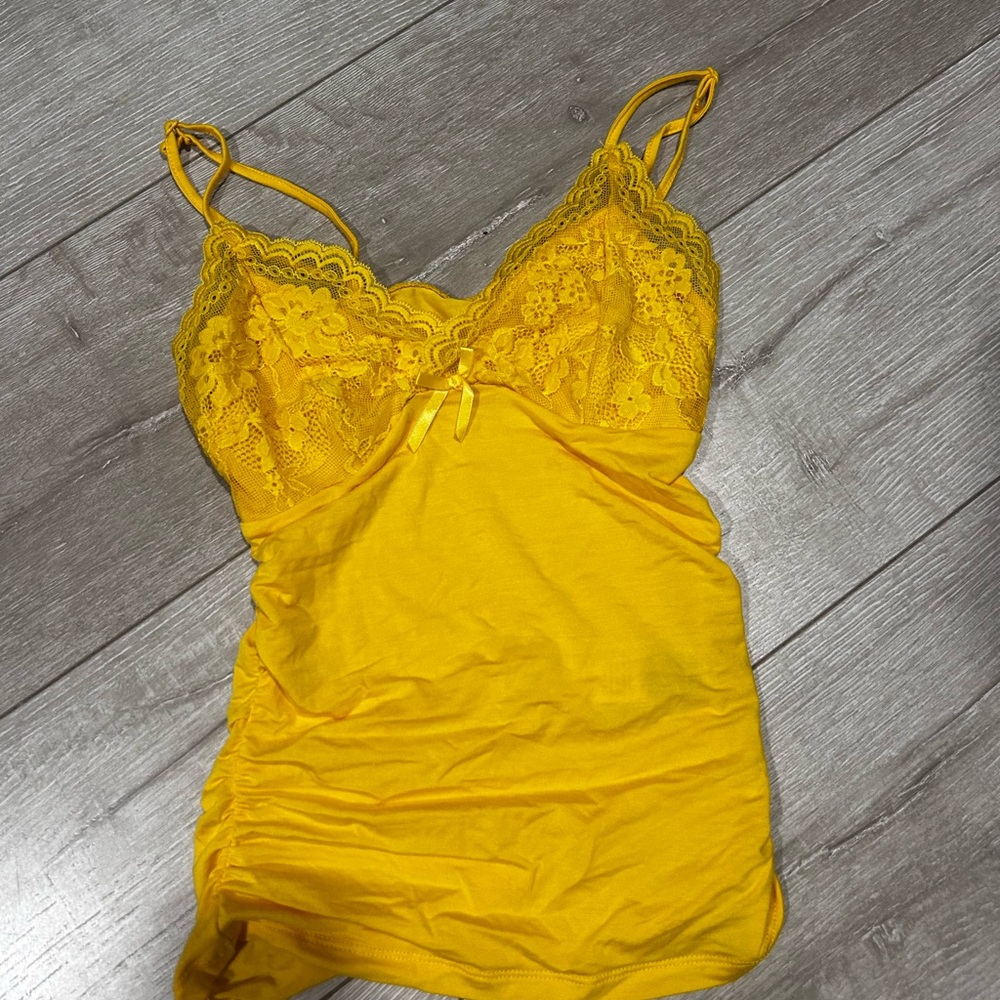 Long yellow tank top with a lace top part with a cute bow